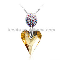 Heart shape natural yellow crystal pendant